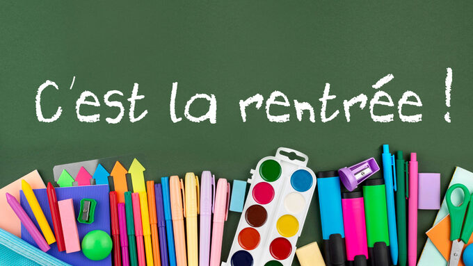 back-school-background-with-school-supplies-green-1-scaled.jpg